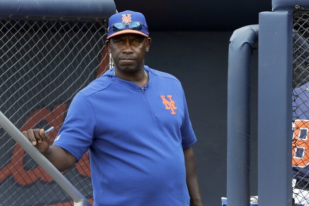 New York Mets hitting coach Chili Davis watches from the top of the dugout steps during the fifth inning of an exhibition spring training baseball game against the Houston Astros Monday, Feb. 25, 2019, in West Palm Beach, Fla. The millennial generation became a hot topic in Chicago when the Cubs fired hitting coach Chili Davis after they struggled to score in the final few days of last season, culminating in their 2-1, 13-inning loss to Colorado in the NL Wild Card Game. Davis told the Chicago Sun-Times that he needed to make some adjustments to how he delivers his message to millennials, and he planned to know more about his potential players before he accepted another job. He was hired as hitting coach for the New York Mets in December. (AP Photo/Jeff Roberson)