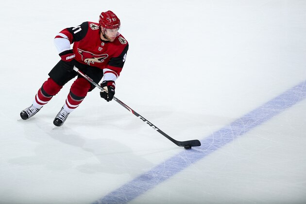 GLENDALE, ARIZONA - FEBRUARY 17: Taylor Hall #91 of the Arizona Coyotes skates with the puck during the first period of the NHL game against the New York Islanders  at Gila River Arena on February 17, 2020 in Glendale, Arizona. The Coyotes defeated the Islanders 2-1.  (Photo by Christian Petersen/Getty Images)