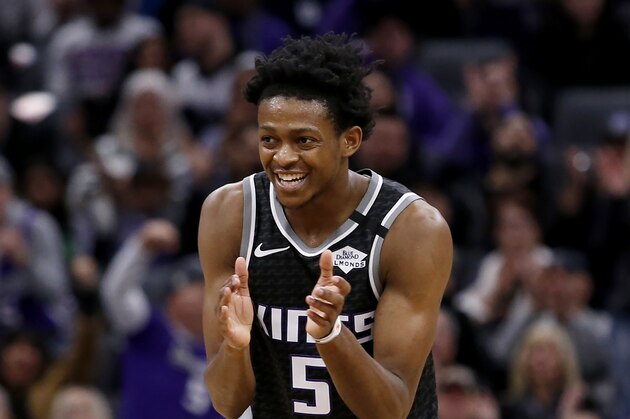 Sacramento Kings guard De'Aaron Fox celebrates in the closing moments of the Kings 113-109 win over the Minnesota Timberwolves in an NBA basketball game in Sacramento, Calif., Monday, Feb. 3, 2020. (AP Photo/Rich Pedroncelli)