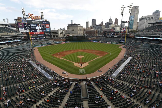 FILE - In this Sept. 16, 2020, file photo, fans at Comerica Park watch a baseball game between the Detroit Tigers and the Baltimore Orioles in Detroit. Gov. Gretchen Whitmer is allowing for the return of pro sports in Michigan as long as fans aren't in attendance. The move Thursday, June 25, 2020, follows Major League Baseball's decision this week to set a 60-game schedule to start July 23 or July 24 in empty ballparks. (AP Photo/Paul Sancya, File)