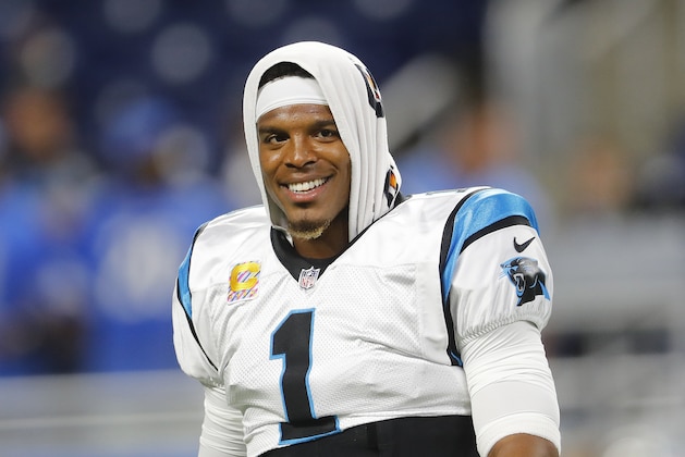 Carolina Panthers quarterback Cam Newton smiles before an NFL football game against the Detroit Lions in Detroit, Sunday, Oct. 8, 2017. (AP Photo/Paul Sancya)