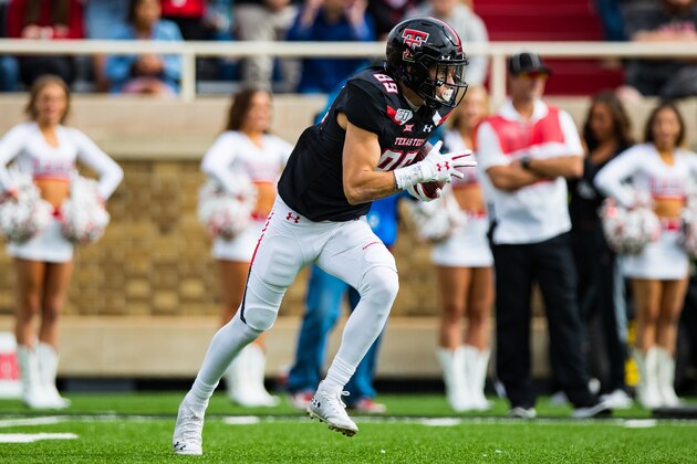 LUBBOCK, TEXAS - NOVEMBER 16: Kick returner Caden Leggett #89 of the Texas Tech Red Raiders returns a kick off during the first half of the college football game against the TCU Horned Frogs on November 16, 2019 at Jones AT&T Stadium in Lubbock, Texas. (Photo by John E. Moore III/Getty Images)