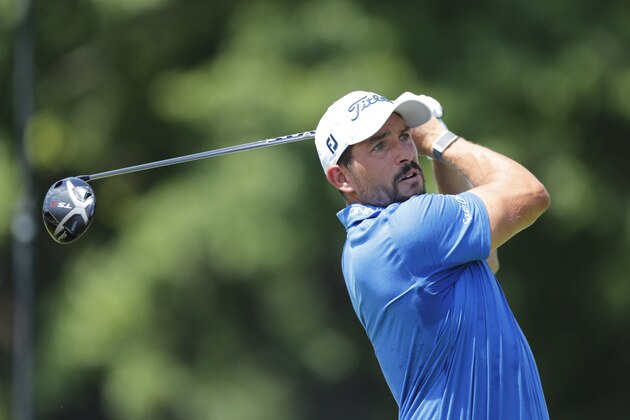 Scott Stallings drives on the 18th tee during the first round of the Rocket Mortgage Classic golf tournament, Thursday, July 2, 2020, at the Detroit Golf Club in Detroit. (AP Photo/Carlos Osorio)