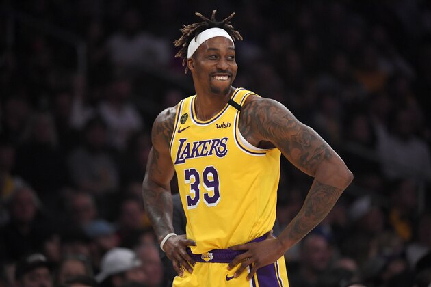 Los Angeles Lakers center Dwight Howard smiles during the second half of an NBA basketball game against the Phoenix Suns Monday, Feb. 10, 2020, in Los Angeles. The Lakers won 125-100. (AP Photo/Mark J. Terrill)