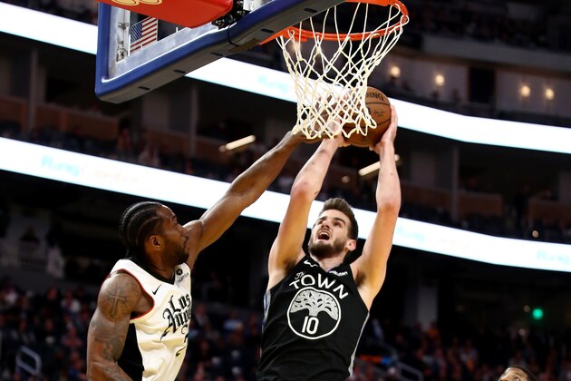 SAN FRANCISCO, CALIFORNIA - MARCH 10:   Dragan Bender #10 of the Golden State Warriors goes up for a shot on Kawhi Leonard #2 of the LA Clippers at Chase Center on March 10, 2020 in San Francisco, California. NOTE TO USER: User expressly acknowledges and agrees that, by downloading and or using this photograph, User is consenting to the terms and conditions of the Getty Images License Agreement.  (Photo by Ezra Shaw/Getty Images)