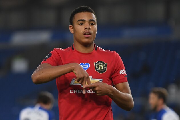 Manchester United's English striker Mason Greenwood celebrates scoring the opening goal during the English Premier League football match between Brighton and Hove Albion and Manchester United at the American Express Community Stadium in Brighton, southern England on June 30, 2020. (Photo by Mike Hewitt / POOL / AFP) / RESTRICTED TO EDITORIAL USE. No use with unauthorized audio, video, data, fixture lists, club/league logos or 'live' services. Online in-match use limited to 120 images. An additional 40 images may be used in extra time. No video emulation. Social media in-match use limited to 120 images. An additional 40 images may be used in extra time. No use in betting publications, games or single club/league/player publications. /  (Photo by MIKE HEWITT/POOL/AFP via Getty Images)