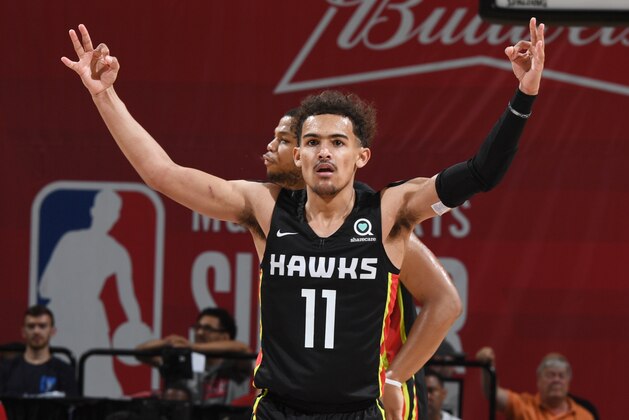 LAS VEGAS, NV - JULY 11: Trae Young #11 of the Atlanta Hawks reacts against the Indiana Pacers  during the 2018 Las Vegas Summer League on July 11, 2018 at the Thomas & Mack Center in Las Vegas, Nevada. NOTE TO USER: User expressly acknowledges and agrees that, by downloading and or using this Photograph, user is consenting to the terms and conditions of the Getty Images License Agreement. Mandatory Copyright Notice: Copyright 2018 NBAE (Photo by Garrett Ellwood/NBAE via Getty Images)