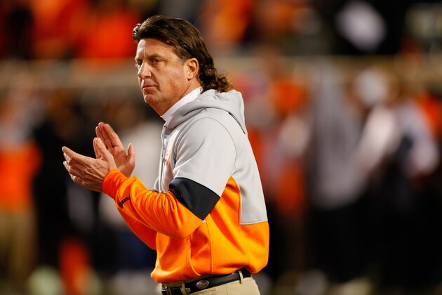 STILLWATER, OK - NOVEMBER 30: Head coach Mike Gundy of the Oklahoma State Cowboys encourages his team before Bedlam against of the Oklahoma Sooners on November 30, 2019 at Boone Pickens Stadium in Stillwater, Oklahoma. OU won 34-16. (Photo by Brian Bahr/Getty Images) STILLWATER, OK - NOVEMBER 30: Head coach Mike Gundy of the Oklahoma State Cowboys encourages his team before Bedlam against of the Oklahoma Sooners on November 30, 2019 at Boone Pickens Stadium in Stillwater, Oklahoma. OU won 34-16. (Photo by Brian Bahr/Getty Images)