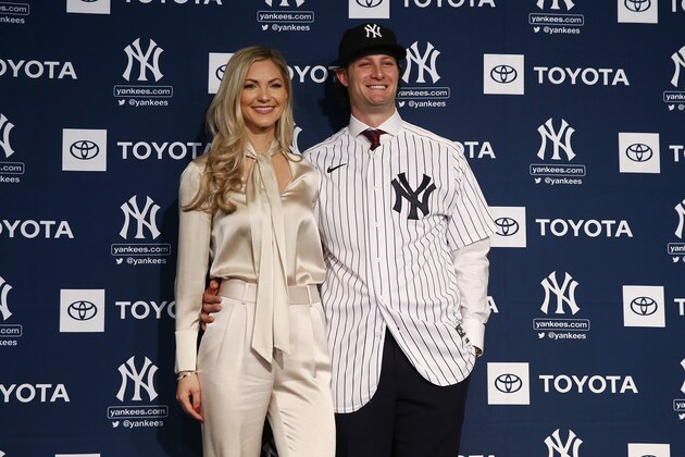 NEW YORK, NEW YORK - DECEMBER 18:  Gerrit Cole and his wife Amy Cole pose for a photo at Yankee Stadium during a press conference at Yankee Stadium on December 18, 2019  in New York City. (Photo by Mike Stobe/Getty Images)