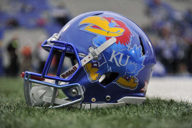 LAWRENCE, KS - NOVEMBER 23: A Kansas Jayhawks helmet rest on the field prior to a game against the Texas Longhorns at Memorial Stadium on November 23, 2018 in Lawrence, Kansas. (Photo by Ed Zurga/Getty Images) LAWRENCE, KS - NOVEMBER 23: A Kansas Jayhawks helmet rest on the field prior to a game against the Texas Longhorns at Memorial Stadium on November 23, 2018 in Lawrence, Kansas. (Photo by Ed Zurga/Getty Images)
