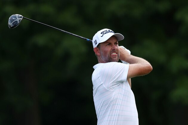 DETROIT, MICHIGAN - JULY 03: Webb Simpson of the United States plays his shot from the 18th tee during the second round of the Rocket Mortgage Classic on July 03, 2020 at the Detroit Golf Club in Detroit, Michigan. (Photo by Leon Halip/Getty Images)