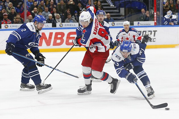 MOSCOW, RUSSIA - JANUARY 08: Vladimir Bryukvin #83 of Dynamo Moscow battles for the puck against Kirill Kaprizov #97 of CSKA Moscow during the first period of the Kontinental Hockey League between Dynamo Moscow and CSKA at the Arena VTB Moscow on January 8, 2020 in Moscow, Russia. (Photo by Anna Sergeeva/ Getty Images)