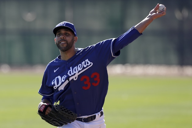 Los Angeles Dodgers pitcher David Price throws during spring training baseball Friday, Feb. 14, 2020, in Phoenix. (AP Photo/Gregory Bull)