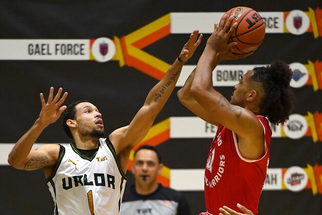 LOS ANGELES, CA - JULY 13:  Jamal Camilo #1 of the Utah Valor defends a shot by Buddha Boyd #10 of the Fort Hood Wounded Warriors  as he goes for a basket in the West Regional of The Basketball Tournament (TBT) at Eagle's Nest Arena on July 13, 2018 in Los Angeles, California.  (Photo by Jayne Kamin-Oncea/Getty Images)
