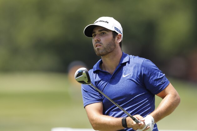 Matthew Wolff watches his drives on the second tee during the third round of the Rocket Mortgage Classic golf tournament, Saturday, July 4, 2020, at the Detroit Golf Club in Detroit. (AP Photo/Carlos Osorio) Matthew Wolff watches his drives on the second tee during the third round of the Rocket Mortgage Classic golf tournament, Saturday, July 4, 2020, at the Detroit Golf Club in Detroit. (AP Photo/Carlos Osorio)