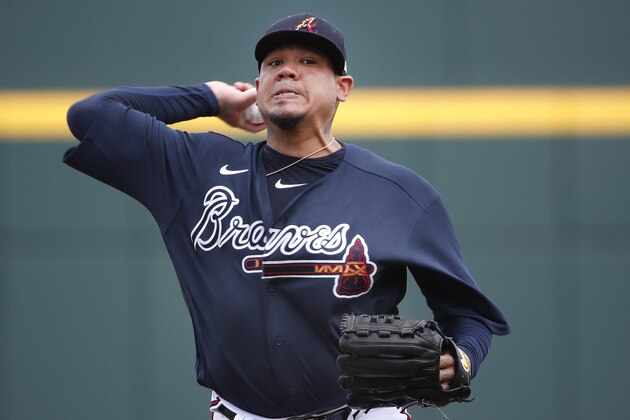 Atlanta Braves starting pitcher Felix Hernandez warms up for a spring training baseball game against the Tampa Bay Rays, Tuesday, March 3, 2020, in Venice, Fla. (AP Photo/Elise Amendola)