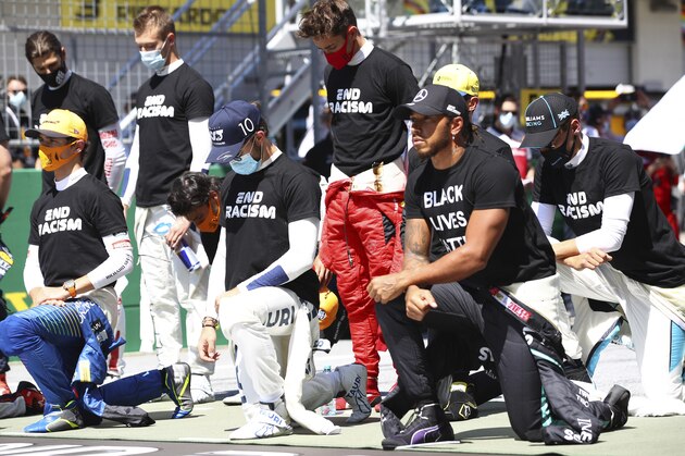 Drivers take a knee n support of the Black Lives Matter movement before the Austrian Formula One Grand Prix race at the Red Bull Ring racetrack in Spielberg, Austria, Sunday, July 5, 2020. (Dan Istitene/Pool via AP) Drivers take a knee n support of the Black Lives Matter movement before the Austrian Formula One Grand Prix race at the Red Bull Ring racetrack in Spielberg, Austria, Sunday, July 5, 2020. (Dan Istitene/Pool via AP)
