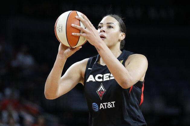 FILE - In this Sept. 24, 2019, file photo, Las Vegas Aces' Liz Cambage (8) plays against the Washington Mystics during the first half of Game 4 of a WNBA playoff basketball series in Las Vegas. Cambage started a GoFundMe page to raise money to help after fires that have devastated her native Australia. The money raised will be divided and distributed equally between many groups, including the Australian Red Cross Disaster Recovery and Relief and World Wildlife Foundation Australia. (AP Photo/John Locher, File)