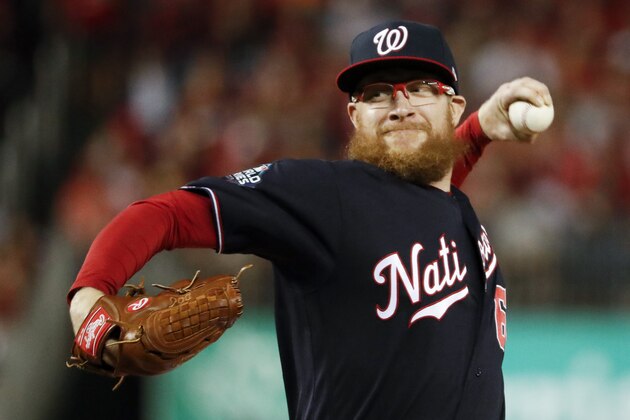 Washington Nationals relief pitcher Sean Doolittle throws during the seventh inning of Game 5 of the baseball World Series against the Houston Astros Sunday, Oct. 27, 2019, in Washington. (AP Photo/Jeff Roberson) Washington Nationals relief pitcher Sean Doolittle throws during the seventh inning of Game 5 of the baseball World Series against the Houston Astros Sunday, Oct. 27, 2019, in Washington. (AP Photo/Jeff Roberson)