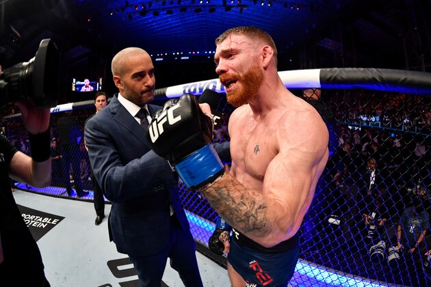 ABU DHABI, UNITED ARAB EMIRATES - SEPTEMBER 07:  (R-L) Paul Felder is interviewed by Jon Anik after his victory over Edson Barboza of Brazil in their lightweight bout during UFC 242 at The Arena on September 7, 2019 in Yas Island, Abu Dhabi, United Arab Emirates. (Photo by Jeff Bottari/Zuffa LLC/Zuffa LLC via Getty Images)