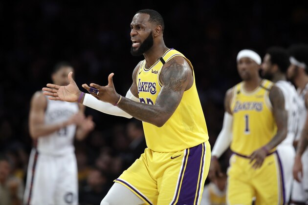 Los Angeles Lakers' LeBron James argues a call during the second half of an NBA basketball game against the Brooklyn Nets Tuesday, March 10, 2020, in Los Angeles. (AP Photo/Marcio Jose Sanchez)