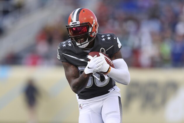 In this Jan. 26, 2020 photo AFC wide receiver Jarvis Landry, of the Cleveland Browns, runs the ball up the field during the NFL Pro Bowl football game against the NFC in Orlando, Fla. The Browns wide receiver has made the most of being quarantined the past two months and said he's ahead of schedule as he recovers from off-season hip surgery. Landry, who has never missed a game in his NFL career, said on a Zoom call Wednesday, May 20, 2020 that his rehab has gone well and that he envisions being back in the field in August _ assuming players are allowed in the wake of the COVID-19 pandemic. (AP Photo/Steve Luciano)