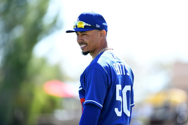 GLENDALE, ARIZONA - FEBRUARY 26: Mookie Betts #50 of the Los Angeles Dodgers prepares for a spring training game against the Los Angeles Angels at Camelback Ranch on February 26, 2020 in Glendale, Arizona. (Photo by Norm Hall/Getty Images)