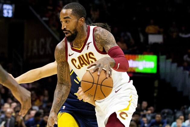 FILE - In this Oct. 8, 2018, file photo, Cleveland Cavaliers guard J.R. Smith dribbles to the basket during the first quarter of a preseason NBA basketball game against the Indiana Pacers in Cleveland. J.R. Smith has joined LeBron James and the Los Angeles Lakers for their championship push. The Lakers announced their long-anticipated signing of Smith as a substitute player on Wednesday, July 1, 2020, the first day allowed under the rules of the NBA's summer restart. (AP Photo/Scott R. Galvin, File)