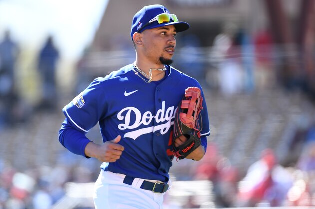 GLENDALE, ARIZONA - FEBRUARY 26: Mookie Betts #50 of the Los Angeles Dodgers runs back to the dugout from right field during a spring training game against the Los Angeles Angels at Camelback Ranch on February 26, 2020 in Glendale, Arizona. (Photo by Norm Hall/Getty Images)