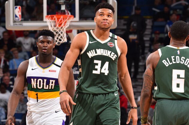 NEW ORLEANS, LA - FEBRUARY 4: Zion Williamson #1 of the New Orleans Pelicans and Giannis Antetokounmpo #34 of the Milwaukee Bucks look on during a game on February 4, 2020 at the Smoothie King Center in New Orleans, Louisiana. NOTE TO USER: User expressly acknowledges and agrees that, by downloading and or using this Photograph, user is consenting to the terms and conditions of the Getty Images License Agreement. Mandatory Copyright Notice: Copyright 2020 NBAE (Photo by Jesse D. Garrabrant/NBAE via Getty Images)