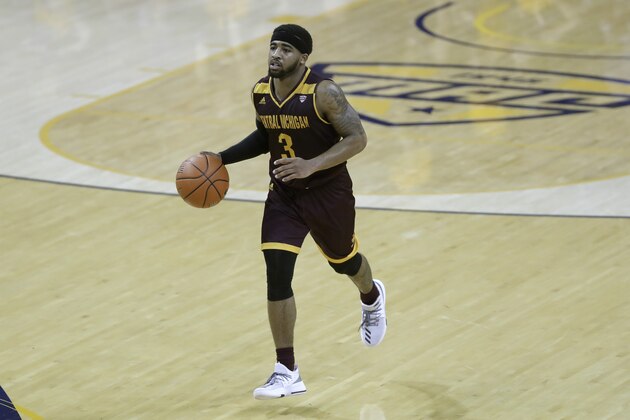 In a photo from Friday, Feb. 24, 2017, in Toledo, Ohio, Central Michigan University guard Marcus Keene brings the ball up court during an NCAA college basketball game against Toledo. (AP Photo/Carlos Osorio)