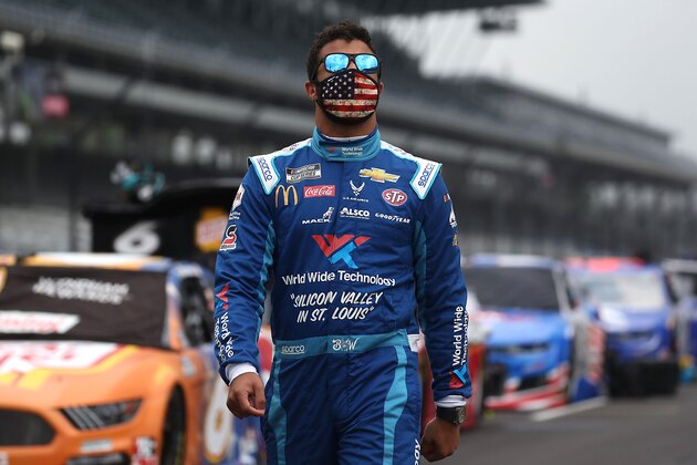 INDIANAPOLIS, INDIANA - JULY 05:  Bubba Wallace, driver of the #43 World Wide Technology Chevrolet, walks the grid prior to the NASCAR Cup Series Big Machine Hand Sanitizer 400 Powered by Big Machine Records at Indianapolis Motor Speedway on July 05, 2020 in Indianapolis, Indiana. (Photo by Chris Graythen/Getty Images)