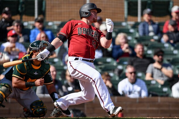 SCOTTSDALE, ARIZONA - FEBRUARY 23: Kole Calhoun #56 of the Arizona Diamondbacks swings at a pitch during the spring training game against the Oakland Athletics at Salt River Fields at Talking Stick on February 23, 2020 in Scottsdale, Arizona. (Photo by Jennifer Stewart/Getty Images)