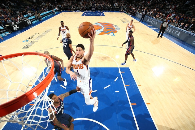 NEW YORK, NY - JANUARY 16: Devin Booker #1 of the Phoenix Suns shoots the ball against the New York Knicks on January 16, 2020 at Madison Square Garden in New York City, New York.  NOTE TO USER: User expressly acknowledges and agrees that, by downloading and or using this photograph, User is consenting to the terms and conditions of the Getty Images License Agreement. Mandatory Copyright Notice: Copyright 2020 NBAE  (Photo by Nathaniel S. Butler/NBAE via Getty Images)
