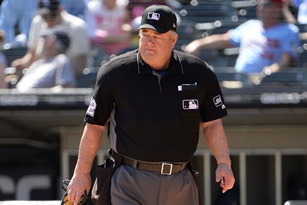 CHICAGO - AUGUST 29:  Umpire Joe West #22 looks on during the game between the Minnesota Twins and Chicago White Sox on August 29, 2019 at Guaranteed Rate Field in Chicago, Illinois.  (Photo by Ron Vesely/MLB Photos via Getty Images)