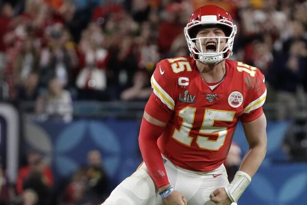 Kansas City Chiefs quarterback Patrick Mahomes (15) celebrates a long pass against the San Francisco 49ers during the second half of the NFL Super Bowl 54 football game Sunday, Feb. 2, 2020, in Miami Gardens, Fla. (AP Photo/Wilfredo Lee)