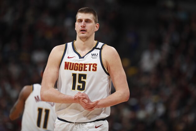 Denver Nuggets center Nikola Jokic (15) in the second half of an NBA basketball game Monday, March 9, 2020, in Denver. The Nuggets won 109-95. (AP Photo/David Zalubowski)