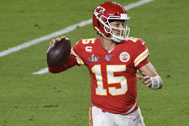 MIAMI, FLORIDA - FEBRUARY 02: Patrick Mahomes #15 of the Kansas City Chiefs looks to pass against the San Francisco 49ers in Super Bowl LIV at Hard Rock Stadium on February 02, 2020 in Miami, Florida. The Chiefs won the game 31-20. (Photo by Focus on Sport/Getty Images)