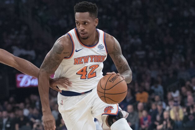 New York Knicks forward Lance Thomas, right, drives to the basket against Boston Celtics forward Al Horford during the first half of an NBA basketball game, Saturday, Oct. 20, 2018, at Madison Square Garden in New York. (AP Photo/Mary Altaffer)