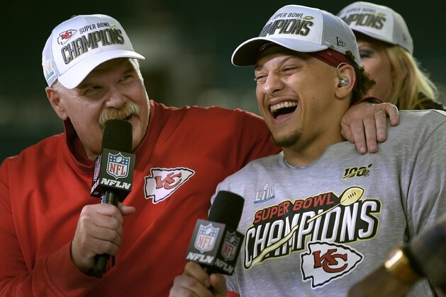 Kansas City Chiefs head coach Andy Reid, left, and quarterback Patrick Mahomes speak during a television interview after defeating the San Francisco 49ers in the NFL Super Bowl 54 football game Sunday, Feb. 2, 2020, in Miami Gardens, Fla. (AP Photo/Mark J. Terrill) Kansas City Chiefs head coach Andy Reid, left, and quarterback Patrick Mahomes speak during a television interview after defeating the San Francisco 49ers in the NFL Super Bowl 54 football game Sunday, Feb. 2, 2020, in Miami Gardens, Fla. (AP Photo/Mark J. Terrill)