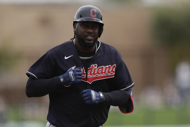 Cleveland Indians' Franmil Reyes reacts after hitting a home run during the second inning of a spring training baseball game against the Chicago White Sox, Friday, Feb. 28, 2020, in Glendale, Ariz. (AP Photo/Gregory Bull)