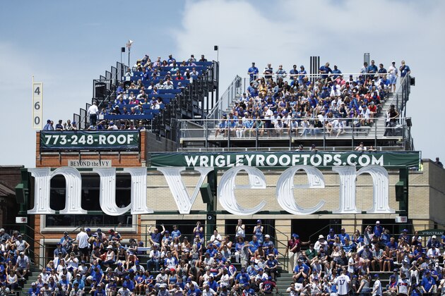 CHICAGO, IL - JUNE 21: General view of the Nuveen Investments sign and Wrigley rooftop seating in rear as the Chicago Cubs play against the San Diego Padres during a game at Wrigley Field on June 21, 2017 in Chicago, Illinois. The Padres defeated the Cubs 3-2. (Photo by Joe Robbins/Getty Images) *** Local Caption ***