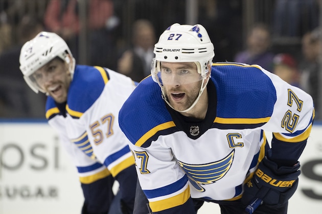 St. Louis Blues defenseman Alex Pietrangelo (27) and left wing David Perron (57) line up for a face-off during the second period of an NHL hockey game against the New York Rangers, Tuesday, March 3, 2020, at Madison Square Garden in New York. (AP Photo/Mary Altaffer)