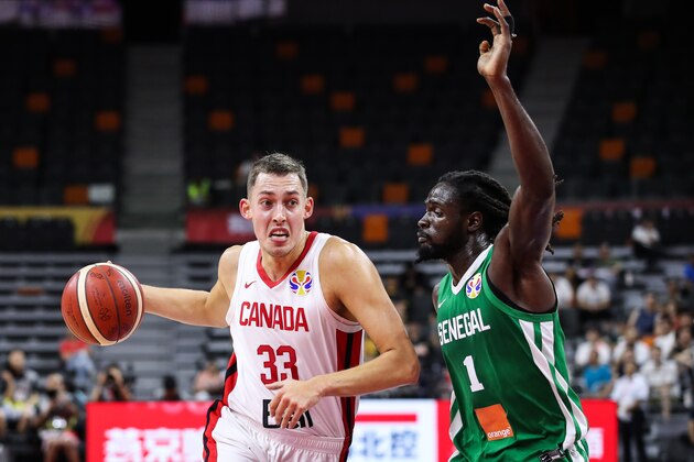 DONGGUAN, CHINA - SEPTEMBER 05: #33 Kyle Wiltjer of Canada drives during the 2019 FIBA World Cup, first round match between Canada and Senegal at Dongguan Basketball Center on September 05, 2019 in Dongguan, China. (Photo by Zhizhao Wu/Getty Images)