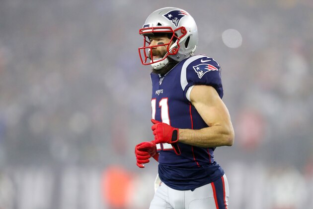 FOXBOROUGH, MASSACHUSETTS - JANUARY 04: Julian Edelman #11 of the New England Patriots jogs as they take on the Tennessee Titans in the first quarter of the AFC Wild Card Playoff game at Gillette Stadium on January 04, 2020 in Foxborough, Massachusetts. (Photo by Maddie Meyer/Getty Images)