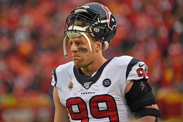 KANSAS CITY, MISSOURI - JANUARY 12: Defensive end J.J. Watt #99 of the Houston Texans looks on from the sideline in the second half during the AFC Divisional playoff game against the Kansas City Chiefs at Arrowhead Stadium on January 12, 2020 in Kansas City, Missouri. (Photo by Peter G. Aiken/Getty Images)