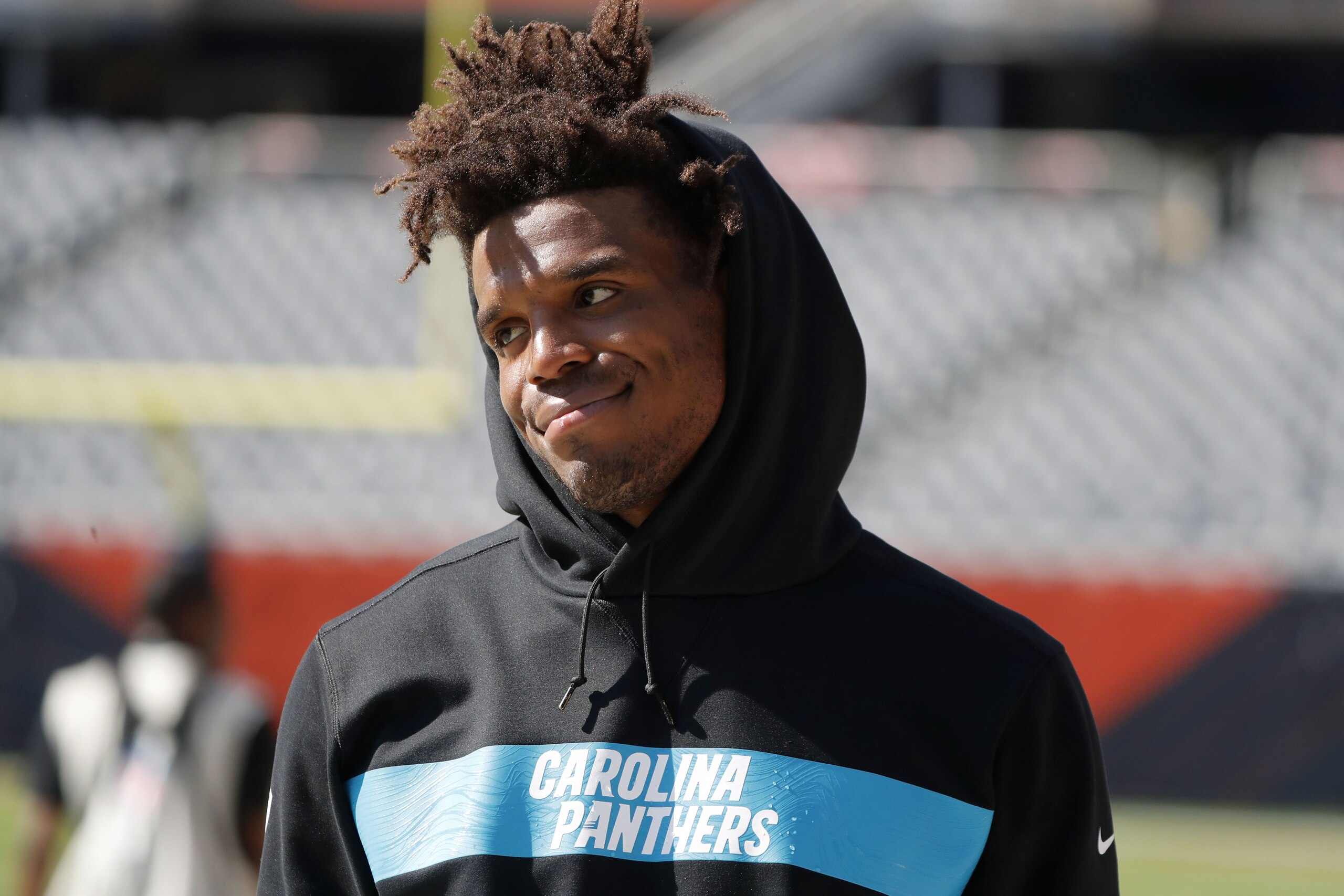 Carolina Panthers quarterback Cam Newton looks toward a teammate before an NFL preseason football game against the Chicago Bears Thursday, Aug. 8, 2019, in Chicago. (AP Photo/Charles Rex Arbogast)