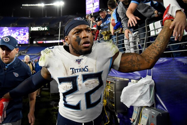 BALTIMORE, MARYLAND - JANUARY 11: Derrick Henry #22 of the Tennessee Titans celebrates with fans after defeating the Baltimore Ravens in the AFC Divisional Playoff game at M&T Bank Stadium on January 11, 2020 in Baltimore, Maryland. (Photo by Will Newton/Getty Images)