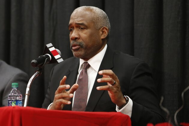FILE - In this Dec. 4, 2018, file photo, Ohio State athletics director Gene Smith answers questions during a news conference in Columbus, Ohio. Ohio State athletic director Gene Smith said the discussion is just beginning on prepare-to-play issues after most programs had spring football practice shortened or wiped out and had to deal with all of their spring sports being called to a halt. (AP Photo/Jay LaPrete, File)