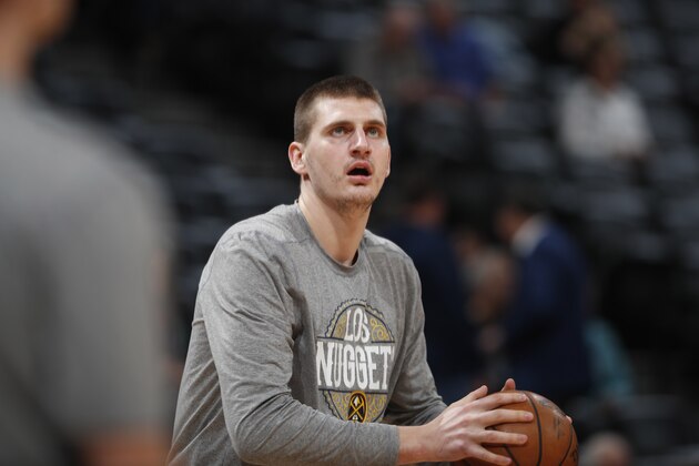 Denver Nuggets center Nikola Jokic (15) in the first half of an NBA basketball game Monday, March 9, 2020, in Denver. (AP Photo/David Zalubowski)